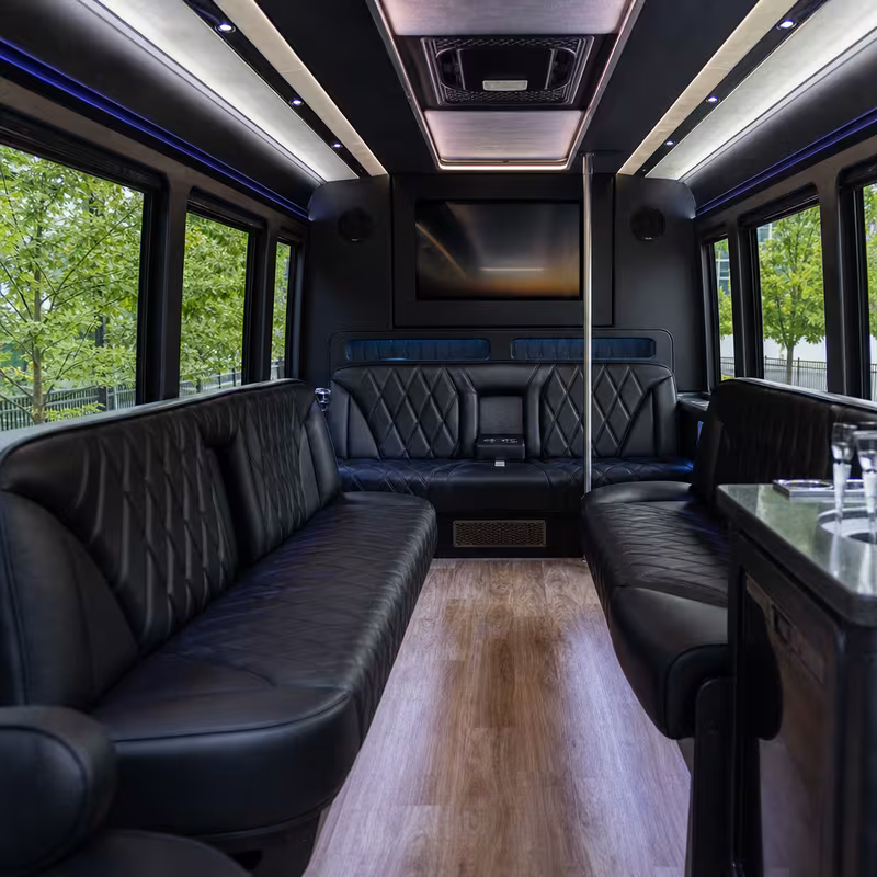 Passenger watching the Newark scenery during a regional party bus road trip