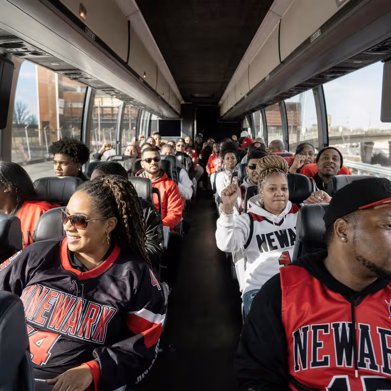 Black Mercedes Sprinter van staged for an Newark Sporting Event Transportation group