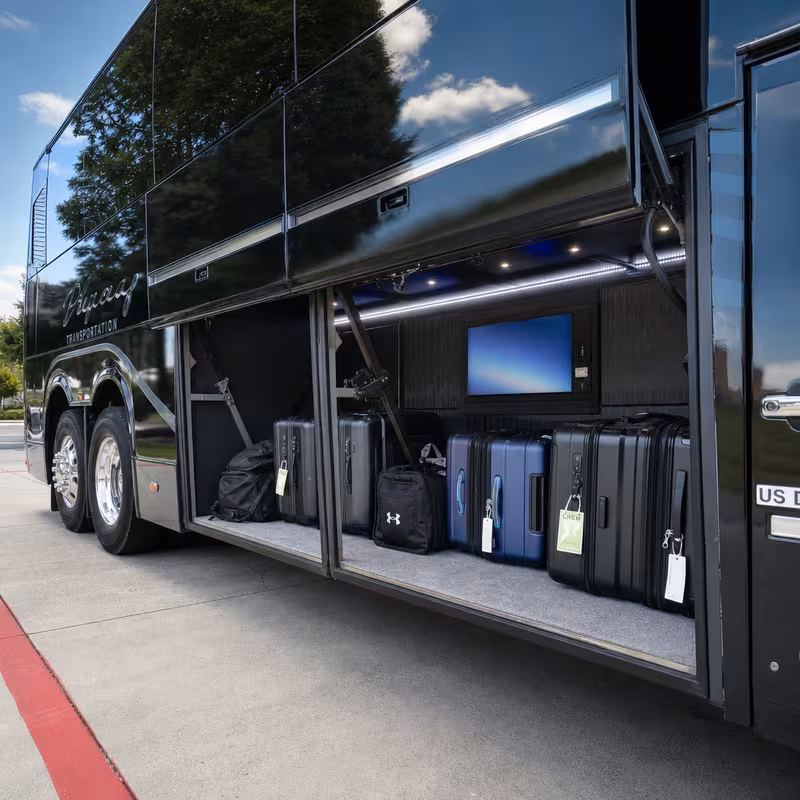 Party bus interior with wraparound leather seating and LED lighting in Newark