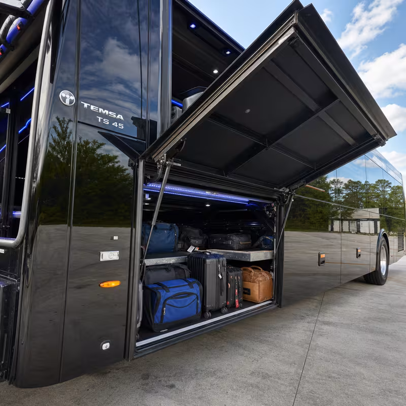 Party bus interior with wraparound leather seating and LED lighting in Newark